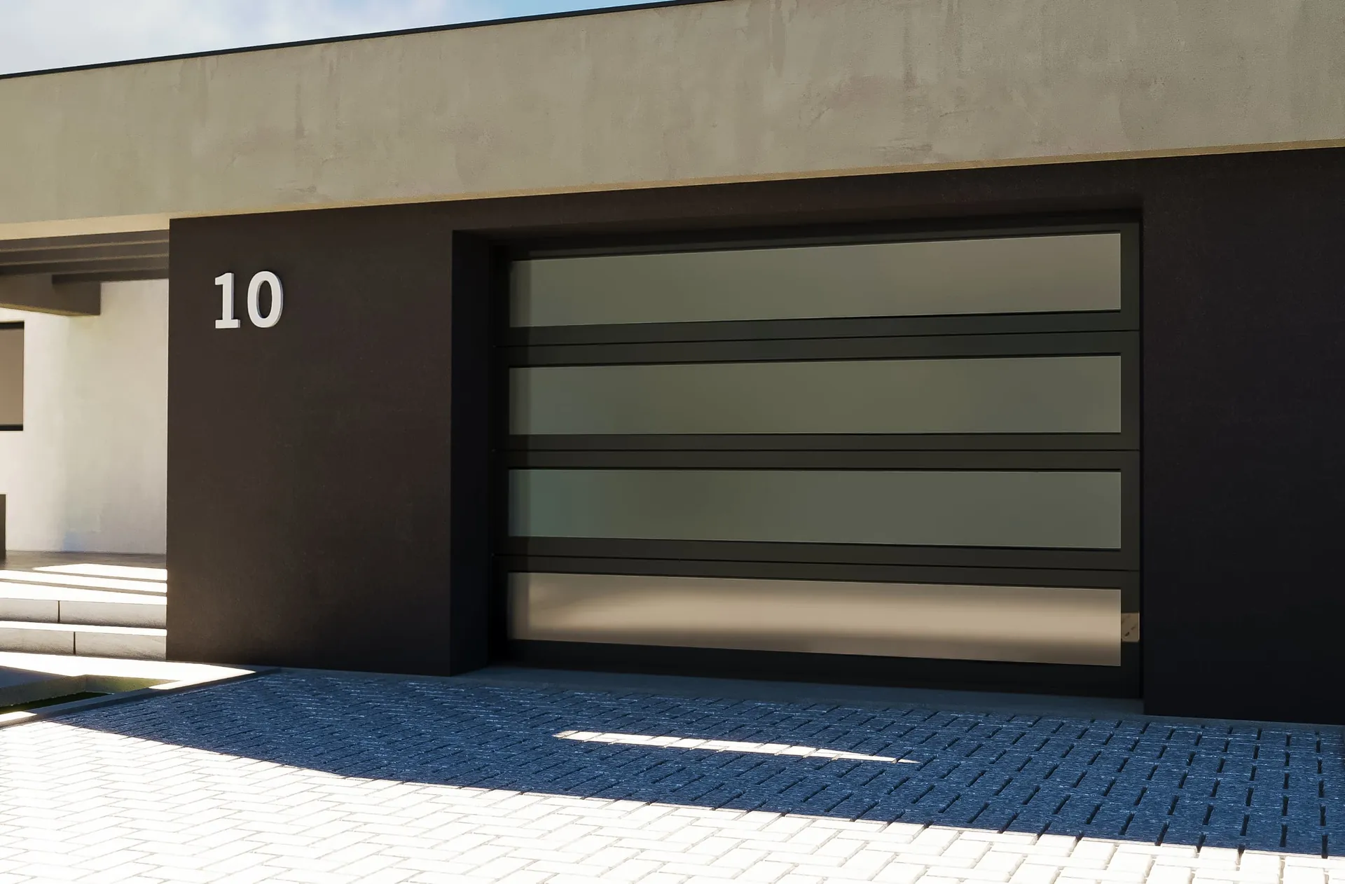 Black frame impact glass garage door on a luxury Miami home, manufactured by Neal Impact Garage Doors